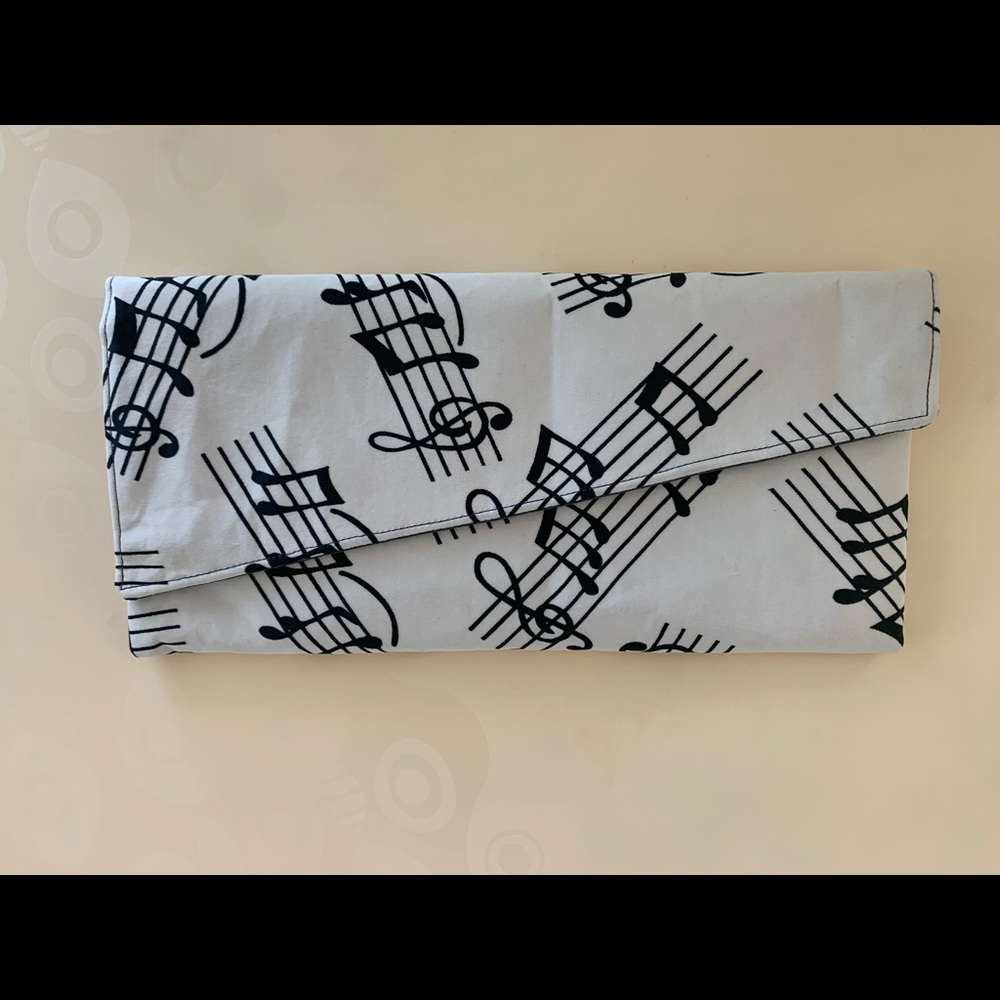 Breathtaking handmade “Musical” clutch